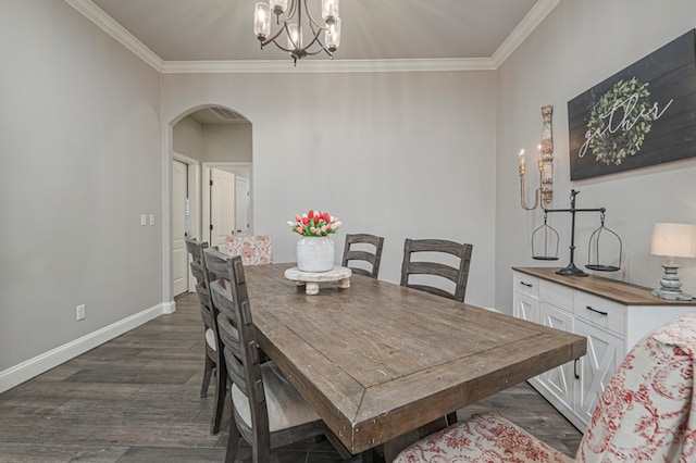 2900 S County Rd 1092, Midland, TX 79706 - dining area with ornamental molding, baseboards, arched walkways, and dark wood finished floors