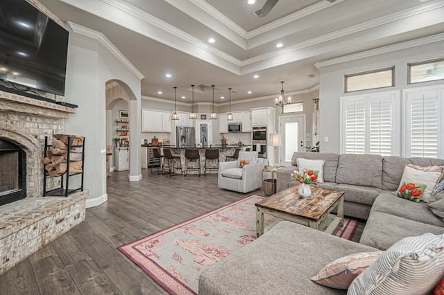 2900 S County Rd 1092, Midland, TX 79706 - living room with baseboards, ornamental molding, a fireplace, dark wood finished floors, and recessed lighting