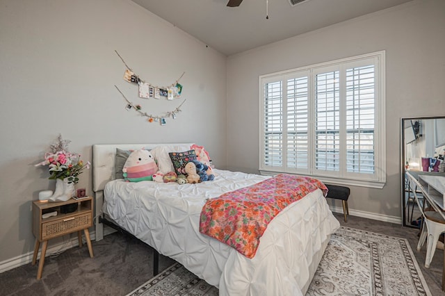 2900 S County Rd 1092, Midland, TX 79706 - bedroom featuring baseboards, a ceiling fan, and carpet