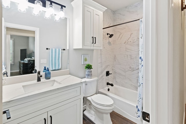 3100 Fairfield Ln, Midland, TX 79705 - bathroom with vanity, shower / bathtub combination with curtain, toilet, and wood finished floors