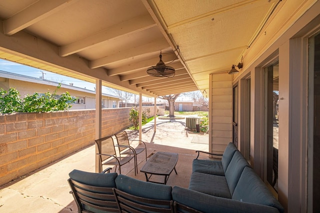 view of patio / terrace featuring ceiling fan