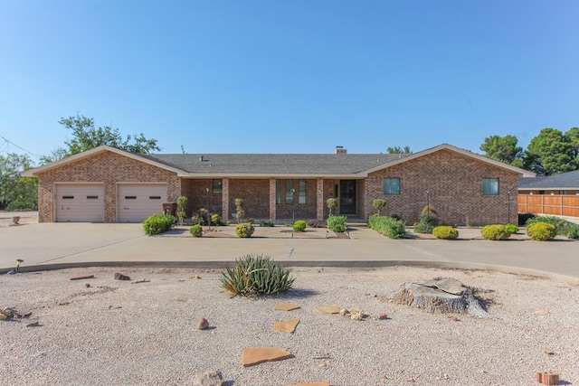 ranch-style house featuring a garage