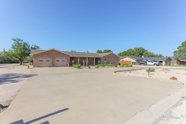 ranch-style home with a garage