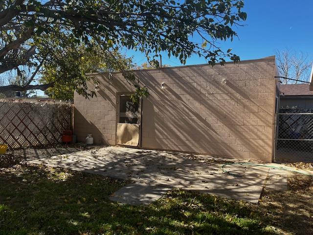 garage with fence