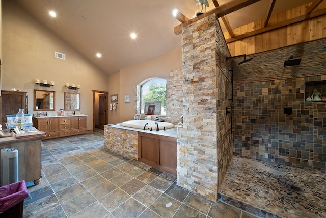 bathroom with vanity, beamed ceiling, high vaulted ceiling, and shower with separate bathtub