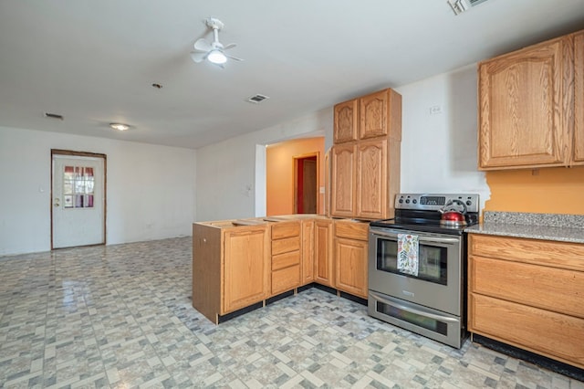 kitchen with stainless steel range with electric cooktop