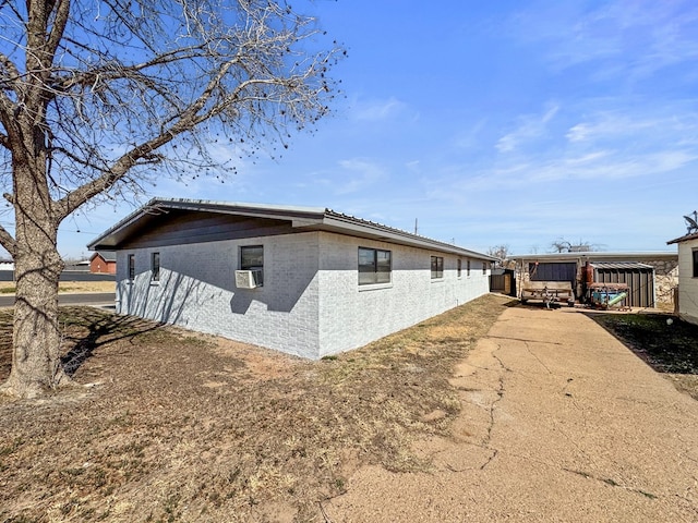 view of home's exterior featuring cooling unit