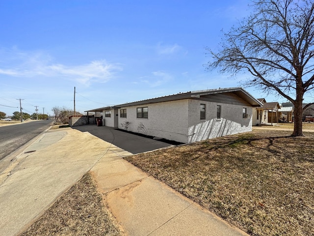 view of home's exterior featuring brick siding