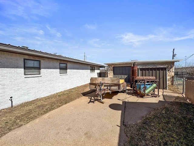 view of patio / terrace with fence