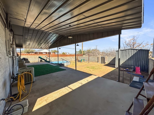 view of patio with a fenced backyard and a fenced in pool