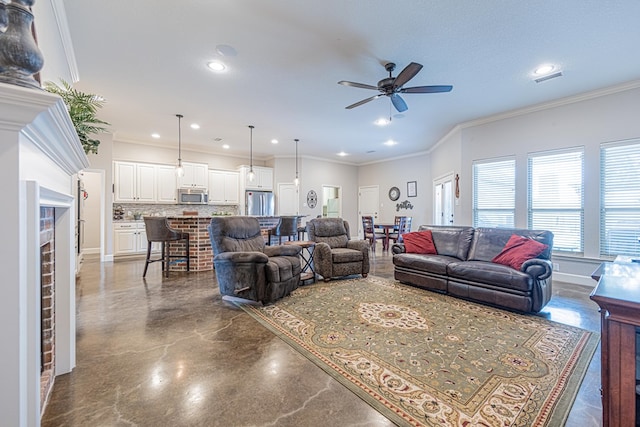 living area with a ceiling fan, recessed lighting, and finished concrete flooring