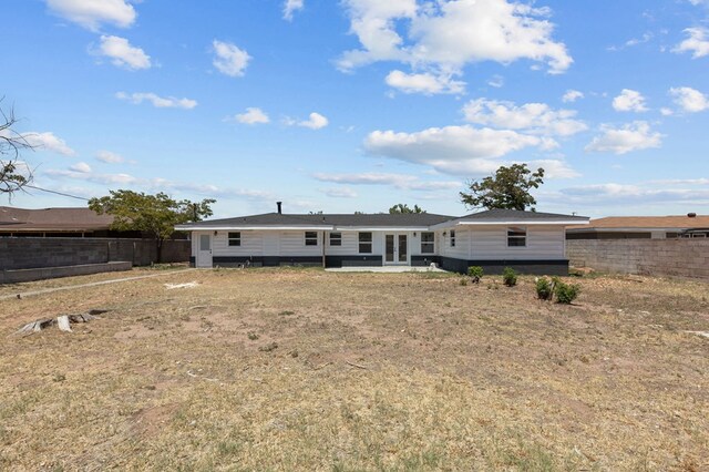 rear view of property with a patio