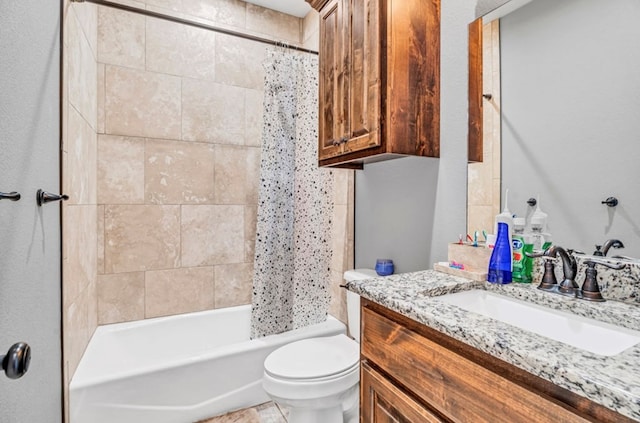 full bathroom with vanity, shower / bath combo with shower curtain, and toilet