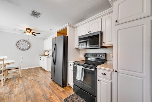 3211 W Shandon Ave, Midland, TX 79705 - kitchen with appliances with stainless steel finishes, white cabinets, ceiling fan, light wood-type flooring, and ornamental molding