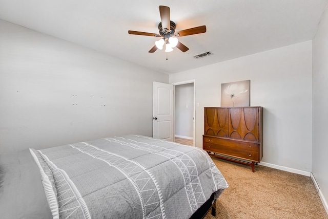 3211 W Shandon Ave, Midland, TX 79705 - carpeted bedroom with baseboards and a ceiling fan
