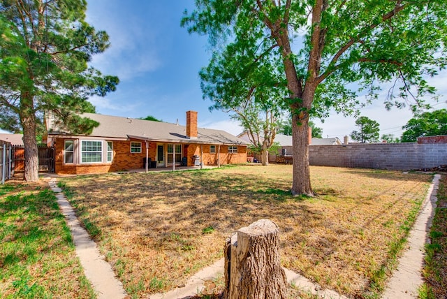 3211 W Shandon Ave, Midland, TX 79705 - view of yard with a patio area