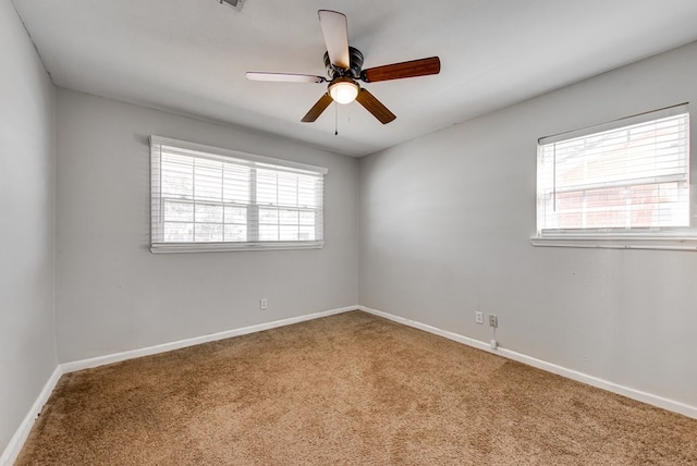 3211 W Shandon Ave, Midland, TX 79705 - carpeted spare room with baseboards and a ceiling fan