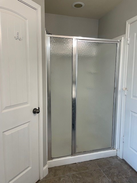 bathroom with a stall shower