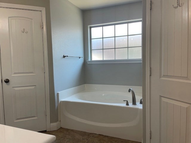 bathroom with a bath