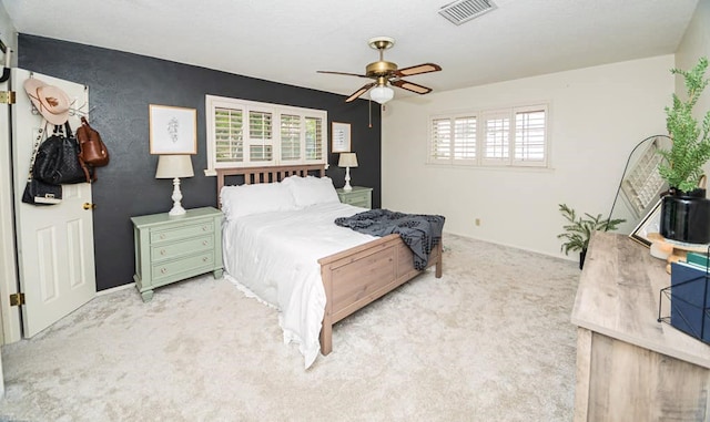 2718 Central Ave, Big Spring, TX 79720 - bedroom featuring light carpet and ceiling fan