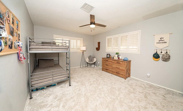 2718 Central Ave, Big Spring, TX 79720 - bedroom with carpet flooring and a ceiling fan