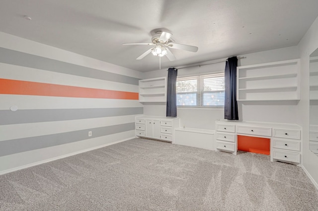 2601 Dengar Ave W, Midland, TX 79705 - spare room featuring a ceiling fan, light colored carpet, and baseboards