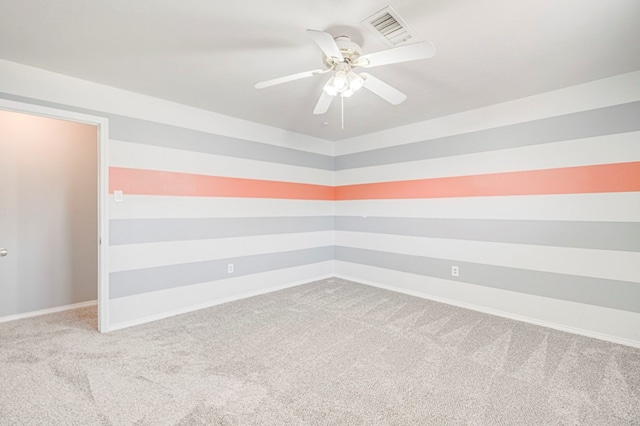 2601 Dengar Ave W, Midland, TX 79705 - empty room featuring carpet flooring, ceiling fan, and baseboards