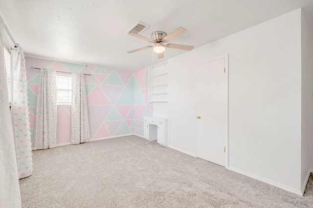 2601 Dengar Ave W, Midland, TX 79705 - carpeted empty room featuring a ceiling fan