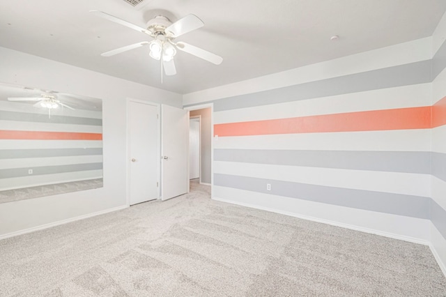 2601 Dengar Ave W, Midland, TX 79705 - empty room with carpet, a ceiling fan, and baseboards