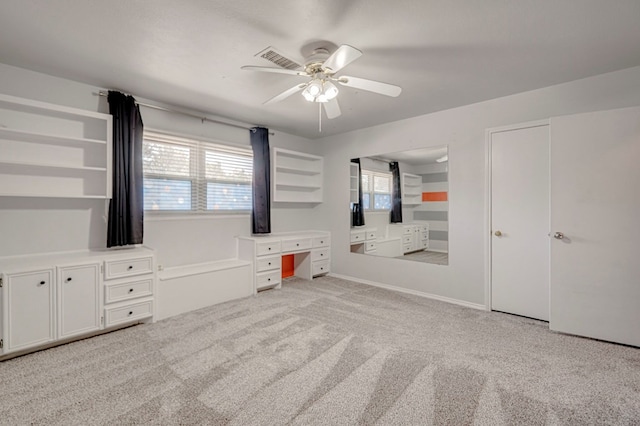 2601 Dengar Ave W, Midland, TX 79705 - unfurnished bedroom featuring carpet floors, a ceiling fan, and an office area