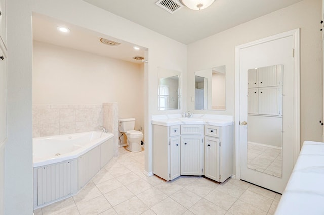 2601 Dengar Ave W, Midland, TX 79705 - bathroom with vanity, a bath, toilet, and tile patterned floors