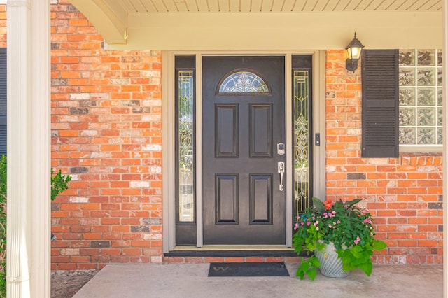 2601 Dengar Ave W, Midland, TX 79705 - view of exterior entry with brick siding and a porch