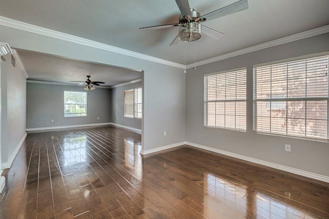 2601 Dengar Ave W, Midland, TX 79705 - empty room featuring ceiling fan, dark wood-style flooring, baseboards, and crown molding