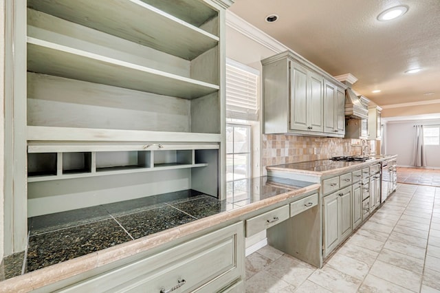 2601 Dengar Ave W, Midland, TX 79705 - kitchen with ornamental molding, decorative backsplash, open shelves, tile countertops, and recessed lighting