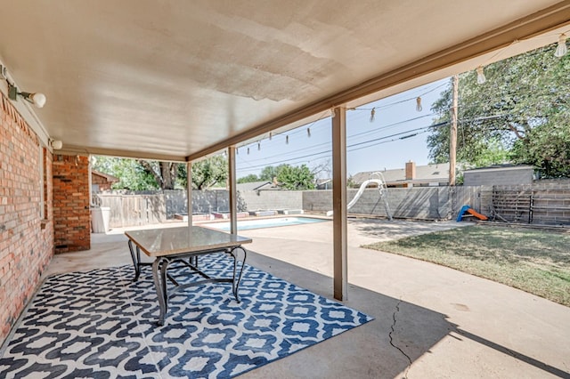 2601 Dengar Ave W, Midland, TX 79705 - fenced backyard with a patio area