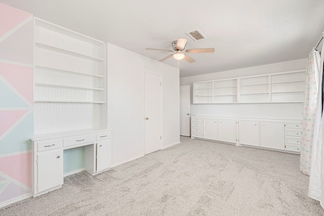 2601 Dengar Ave W, Midland, TX 79705 - unfurnished bedroom featuring light colored carpet, baseboards, and ceiling fan