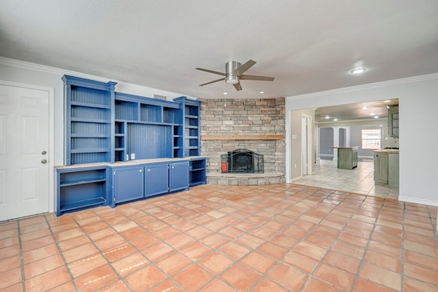 2601 Dengar Ave W, Midland, TX 79705 - unfurnished living room featuring ceiling fan, ornamental molding, a fireplace, recessed lighting, and tile patterned floors