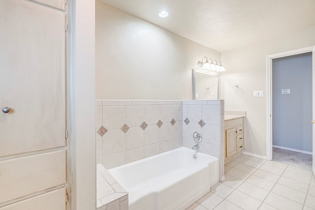 2601 Dengar Ave W, Midland, TX 79705 - bathroom featuring vanity, a garden tub, tile patterned floors, and baseboards