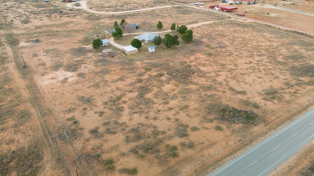 birds eye view of property featuring a rural view