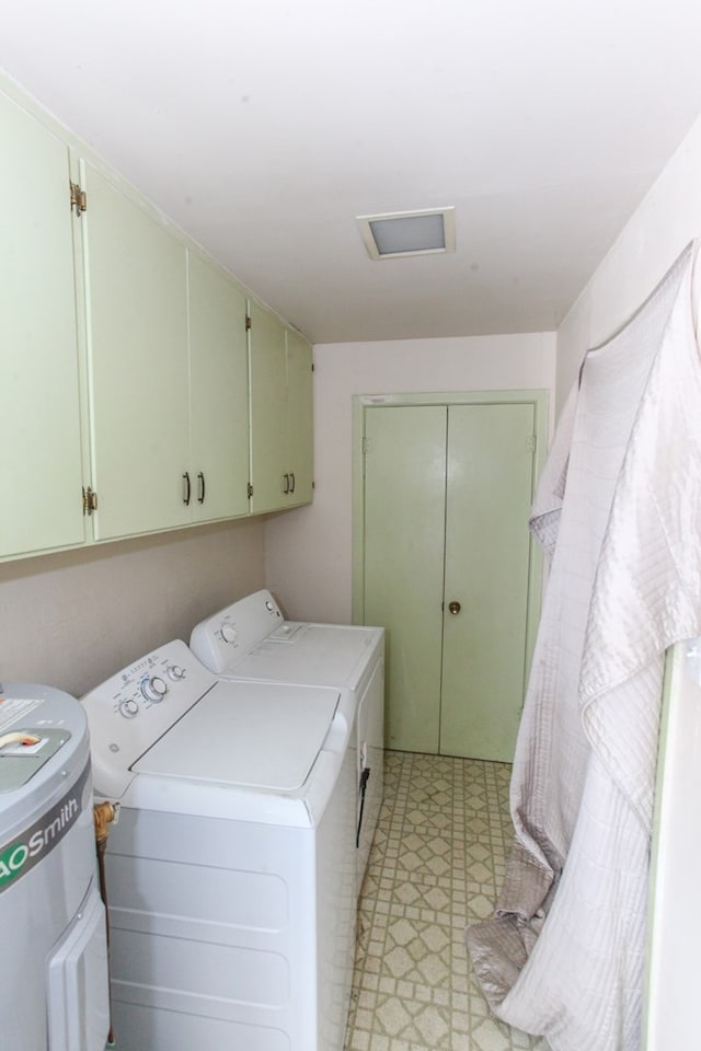 1706 Harvard Ave, Big Spring, TX 79720 - washroom with cabinet space, independent washer and dryer, light flooring, and attic access