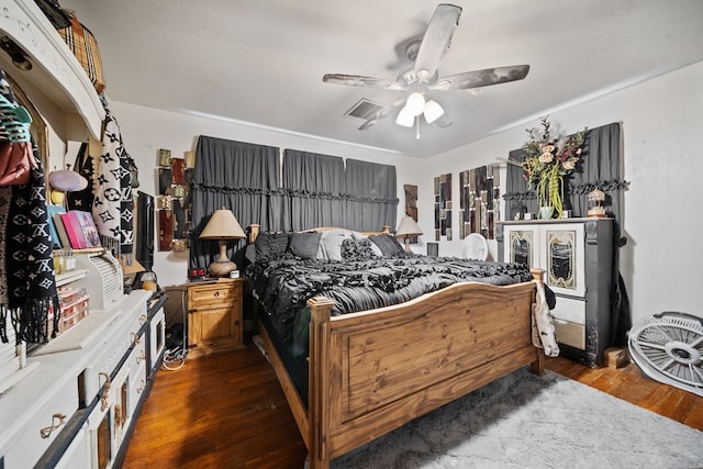 1606 Johnson St, Big Spring, TX 79720 - bedroom with wood finished floors and ceiling fan