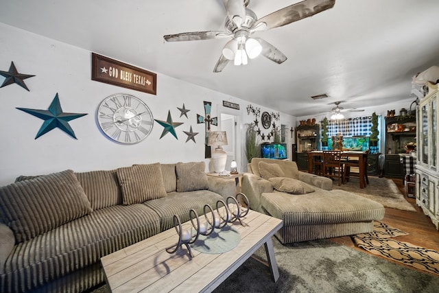 1606 Johnson St, Big Spring, TX 79720 - living area with ceiling fan and wood finished floors