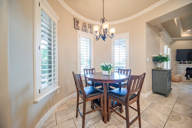 dining room featuring an inviting chandelier and crown molding