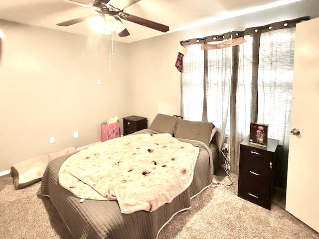 2204 Regal Pl, Midland, TX 79707 - carpeted bedroom featuring a ceiling fan