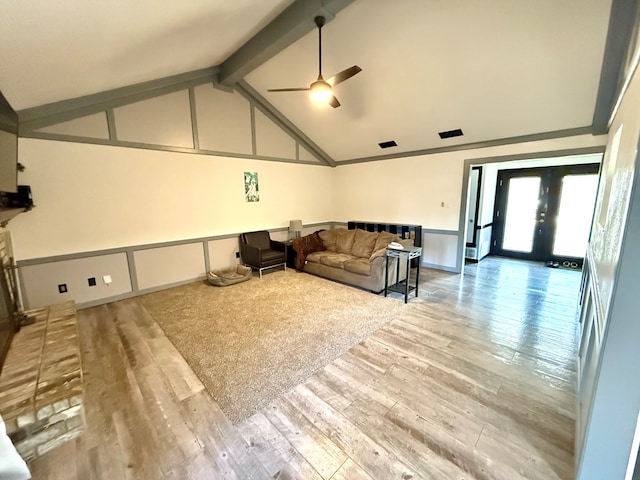 2204 Regal Pl, Midland, TX 79707 - living room featuring ceiling fan, wood finished floors, wainscoting, and french doors