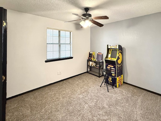 2204 Regal Pl, Midland, TX 79707 - carpeted office with ceiling fan, a textured ceiling, and baseboards