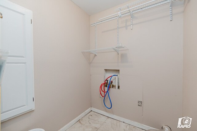 laundry area with hookup for a washing machine and electric dryer hookup