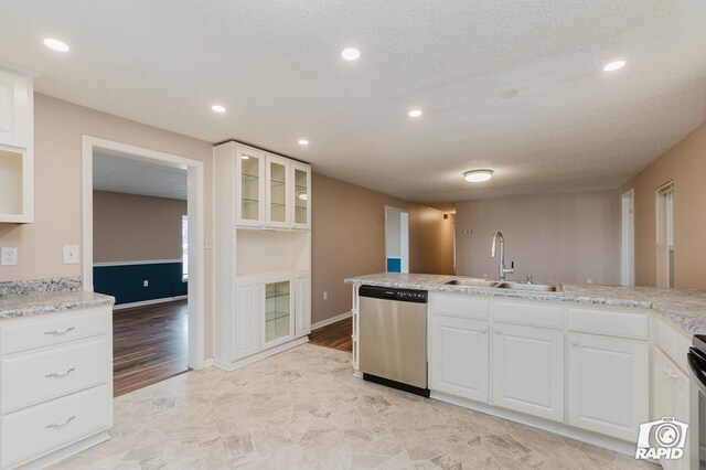 kitchen featuring white cabinets, light hardwood / wood-style floors, sink, and appliances with stainless steel finishes