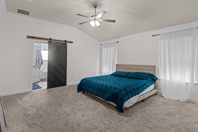 1220 Wrangler Ln, Midland, TX 79705 - carpeted bedroom with baseboards, crown molding, a barn door, visible vents, and lofted ceiling