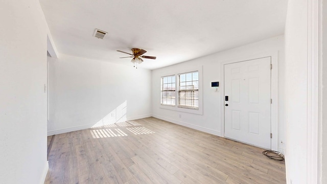 entryway with light wood-type flooring and ceiling fan